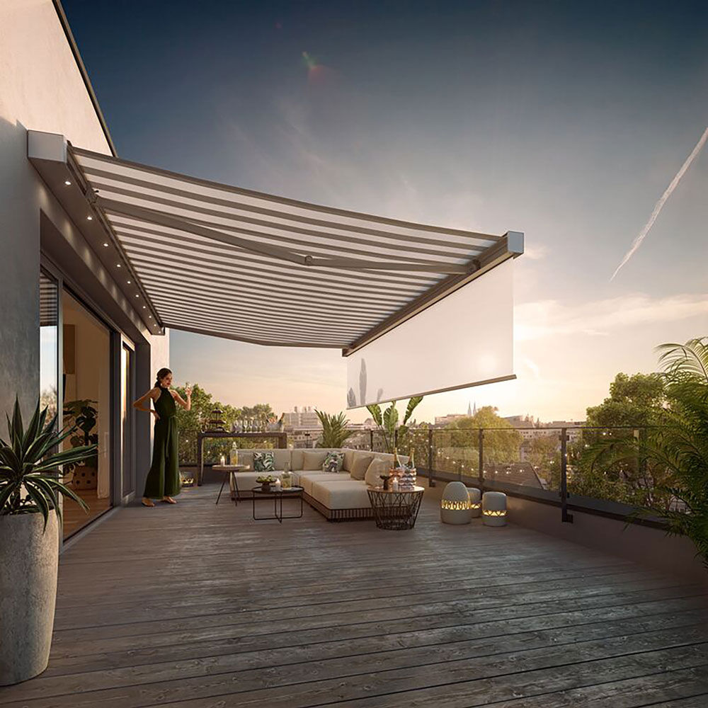 A spacious terrace with a large awning casting shadows, greenery in planters, and a comfortable seating area. A spacious terrace with a large awning casting shadows, greenery in planters, and a comfortable seating area.