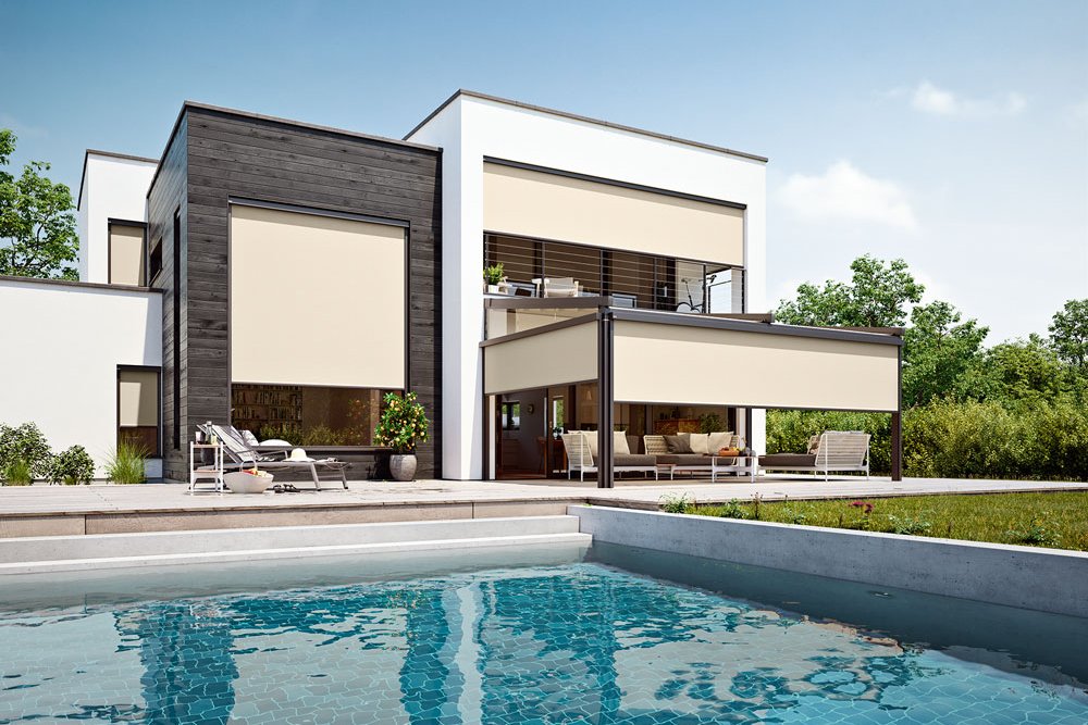 Modern house with beige and dark grey elements, featuring a pool and outdoor shaded areas. Modern house with beige and dark grey elements, featuring a pool and outdoor shaded areas.