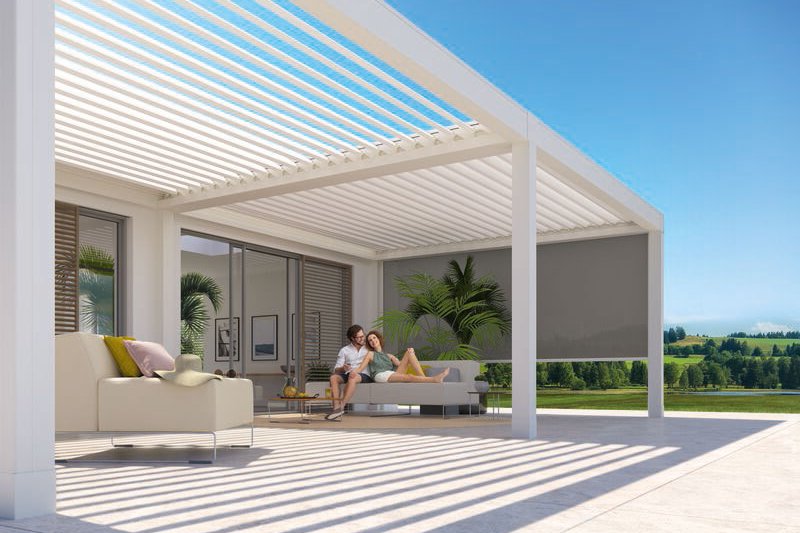A modern outdoor space featuring a sleek structure with horizontal slats and a patio area. Bright sunlight and greenery. A modern outdoor space featuring a sleek structure with horizontal slats and a patio area. Bright sunlight and greenery.