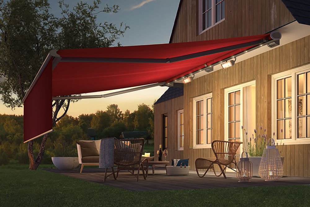 A patio with a red canopy, wooden house, and chairs, surrounded by grass and trees in a peaceful setting. A patio with a red canopy, wooden house, and chairs, surrounded by grass and trees in a peaceful setting.