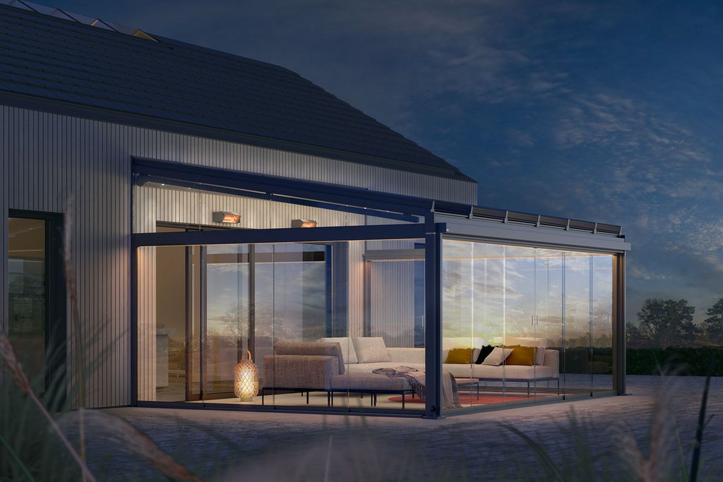 Modern winter garden with glass walls, a sleek roof, and outdoor seating illuminated at dusk. Modern winter garden with glass walls, a sleek roof, and outdoor seating illuminated at dusk.