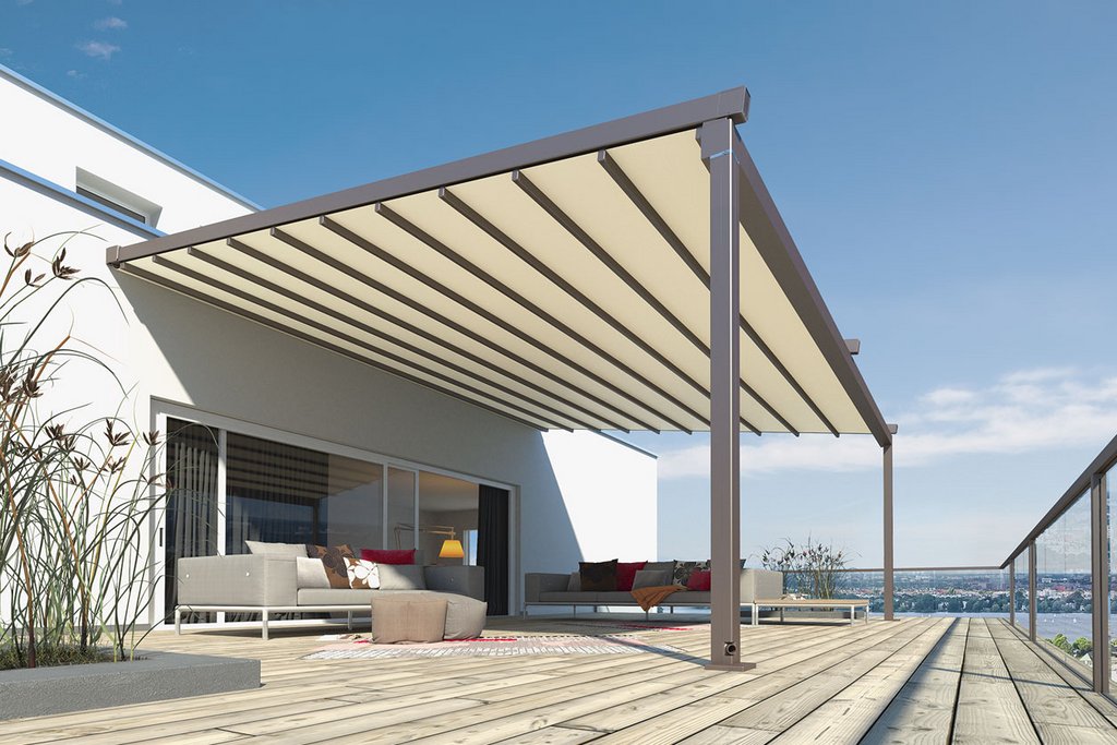 A modern overhang with a sloped roof providing shade over a wooden terrace area. A modern overhang with a sloped roof providing shade over a wooden terrace area.
